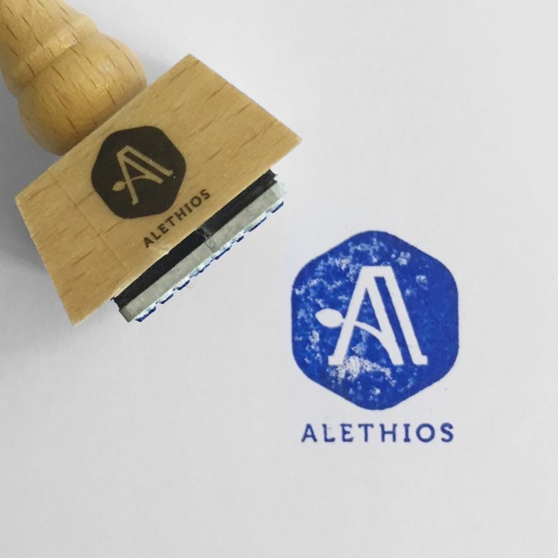 Alethios Logo Stempel MHG Bern / Grafikdesign